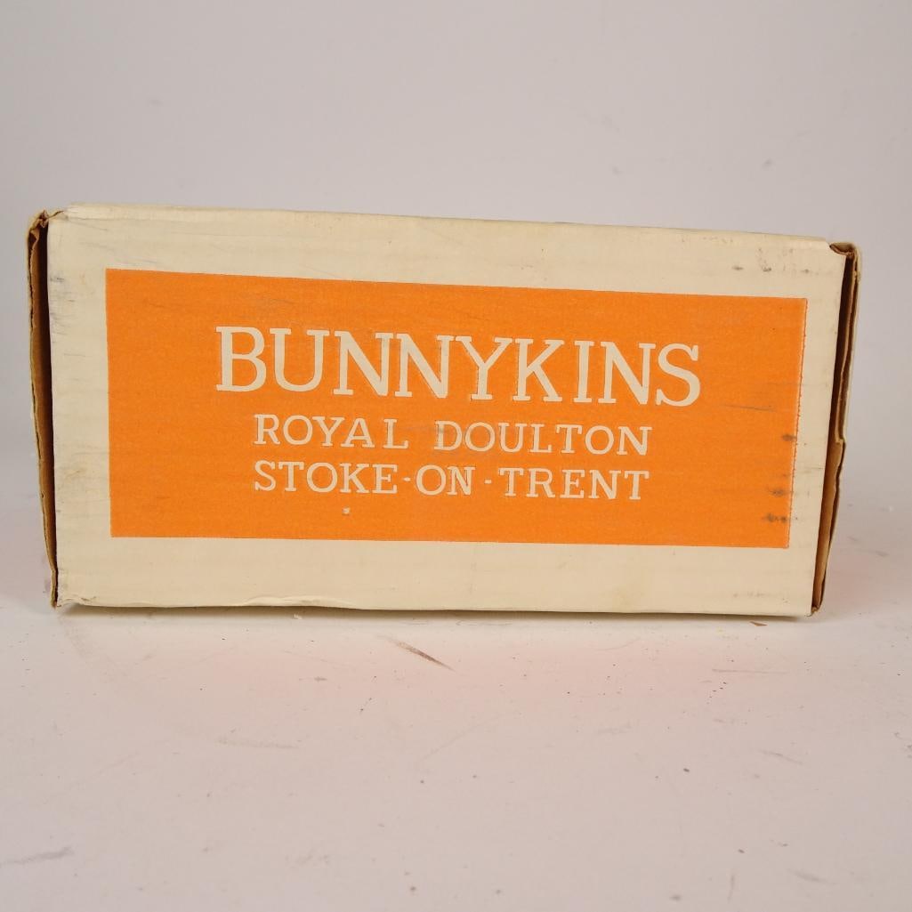 Royal Doulton Bunnykins 2-Piece Baby Set: Charming vintage 2-piece Bunnykins baby set by Royal Doulton, made in Stoke-on-Trent, England. This set includes a shallow feeding bowl and a two-handled loving cup, both decorated with the classic Bu