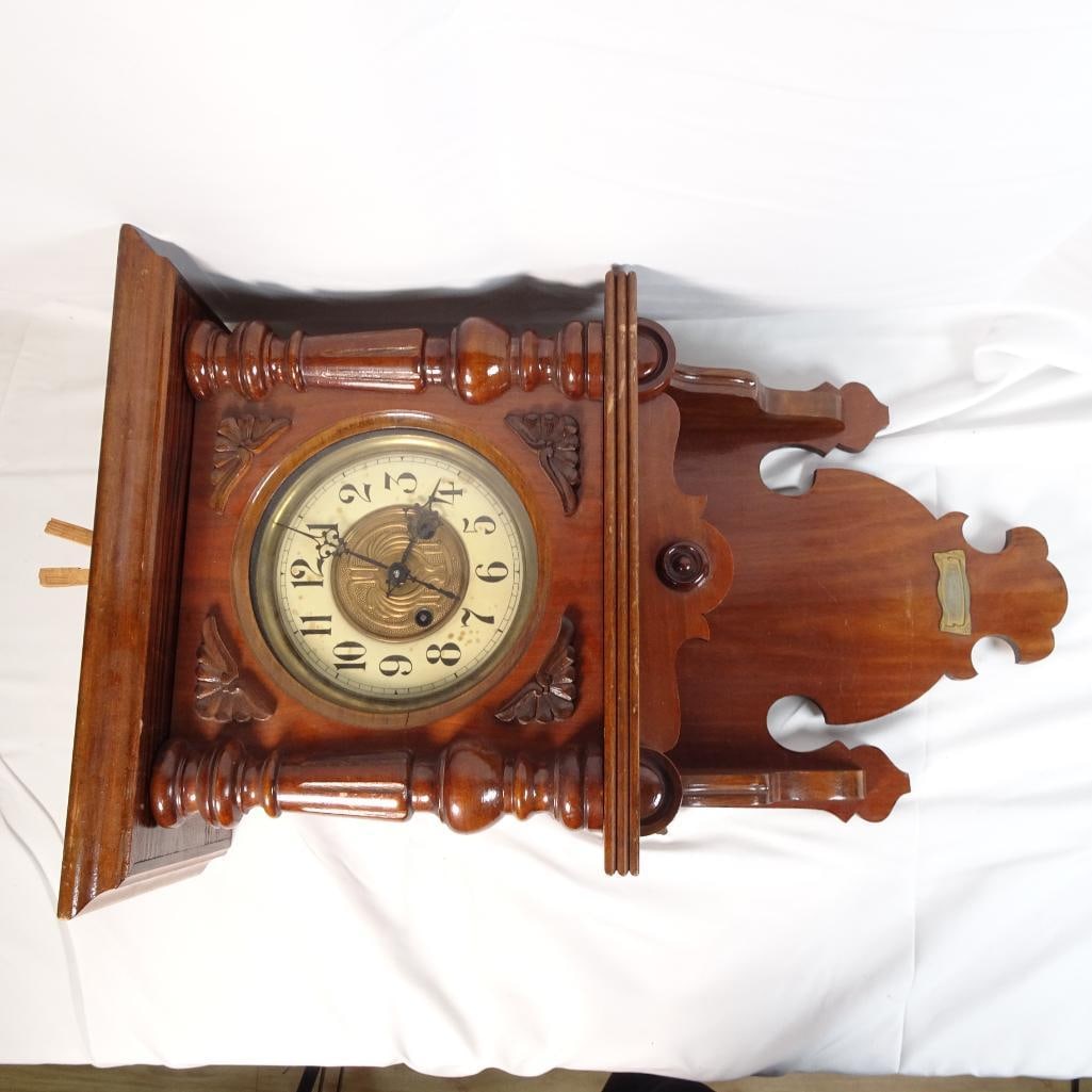 Antique Style Wooden Wall Clock German Movement Schatz? Vienna Regulator Gingerbread Case: Beautiful vintage wooden wall clock featuring a classic Vienna / gingerbread style case with turned columns and carved details. The clock has a traditional mechanical wind-up movement with ornate hand
