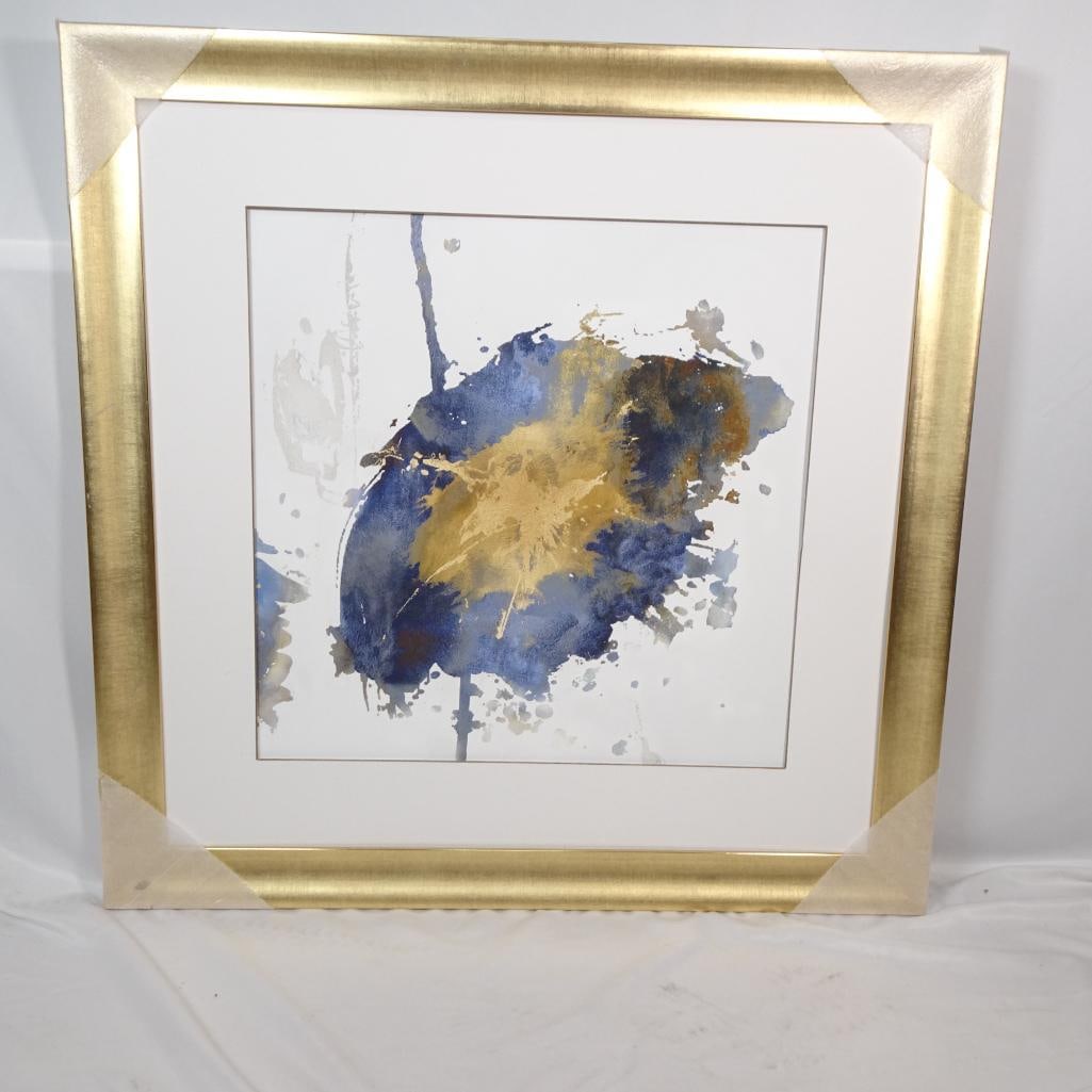 Large Framed Abstract Watercolor Style Wall Art: Beautiful large contemporary abstract artwork featuring blue, gold and neutral tones in an elegant gold frame. This modern watercolor-style piece adds a sophisticated touch to any living room, bedroom
