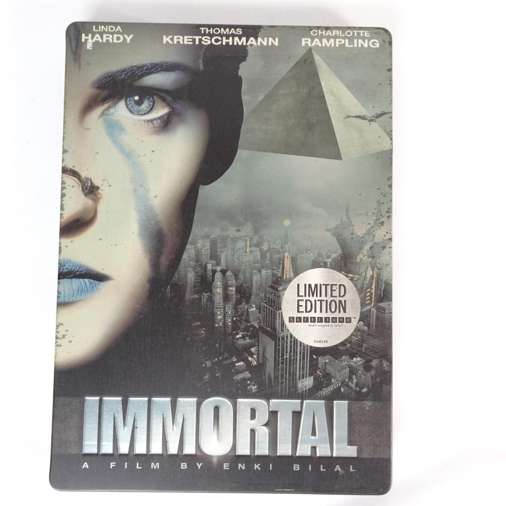 Immortal (2004) Limited Edition Steelbook DVD Enki Bilal Sci-Fi Film: Immortal (2004) Limited Edition Steelbook DVD Limited edition Steelbook release of the science fiction film Immortal, directed by Enki Bilal and starring Linda Hardy, Thomas Kretschmann, and Charlotte