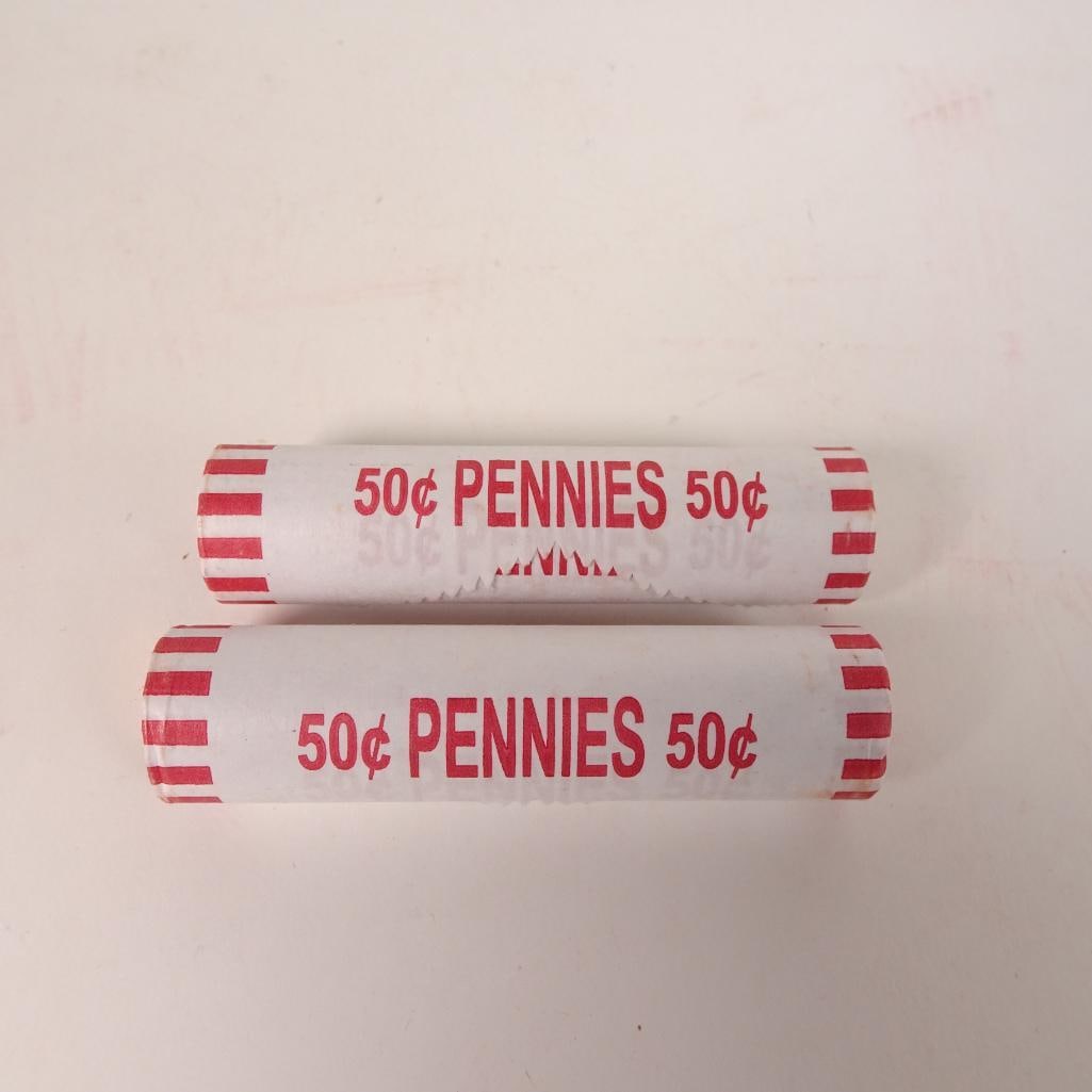 2 Bank Wrapped Penny Rolls: Lot of 2 bank-wrapped rolls of U.S. Lincoln pennies (50? each roll). Coins remain sealed in original paper wrappers as shown in photos. Great addition for coin collectors, beginners, or anyone who enj