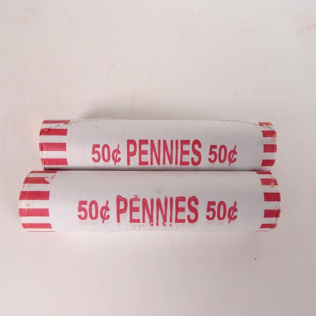 2 Bank Wrapped Penny Rolls: Lot of 2 bank-wrapped rolls of U.S. Lincoln pennies (50? each roll). Coins remain sealed in original paper wrappers as shown in photos. Great addition for coin collectors, beginners, or anyone who enj