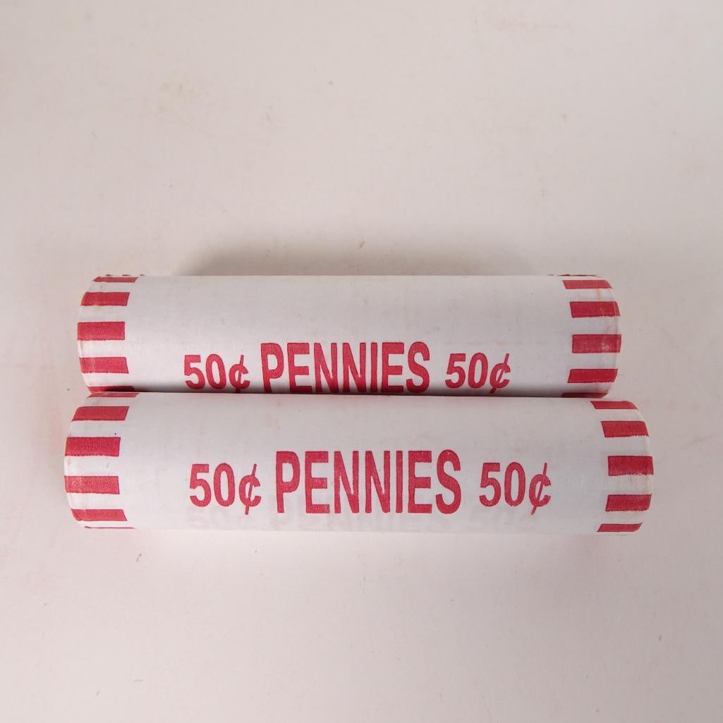 2 Bank Wrapped Penny Rolls: Lot of 2 bank-wrapped rolls of U.S. Lincoln pennies (50? each roll). Coins remain sealed in original paper wrappers as shown in photos. Great addition for coin collectors, beginners, or anyone who enj