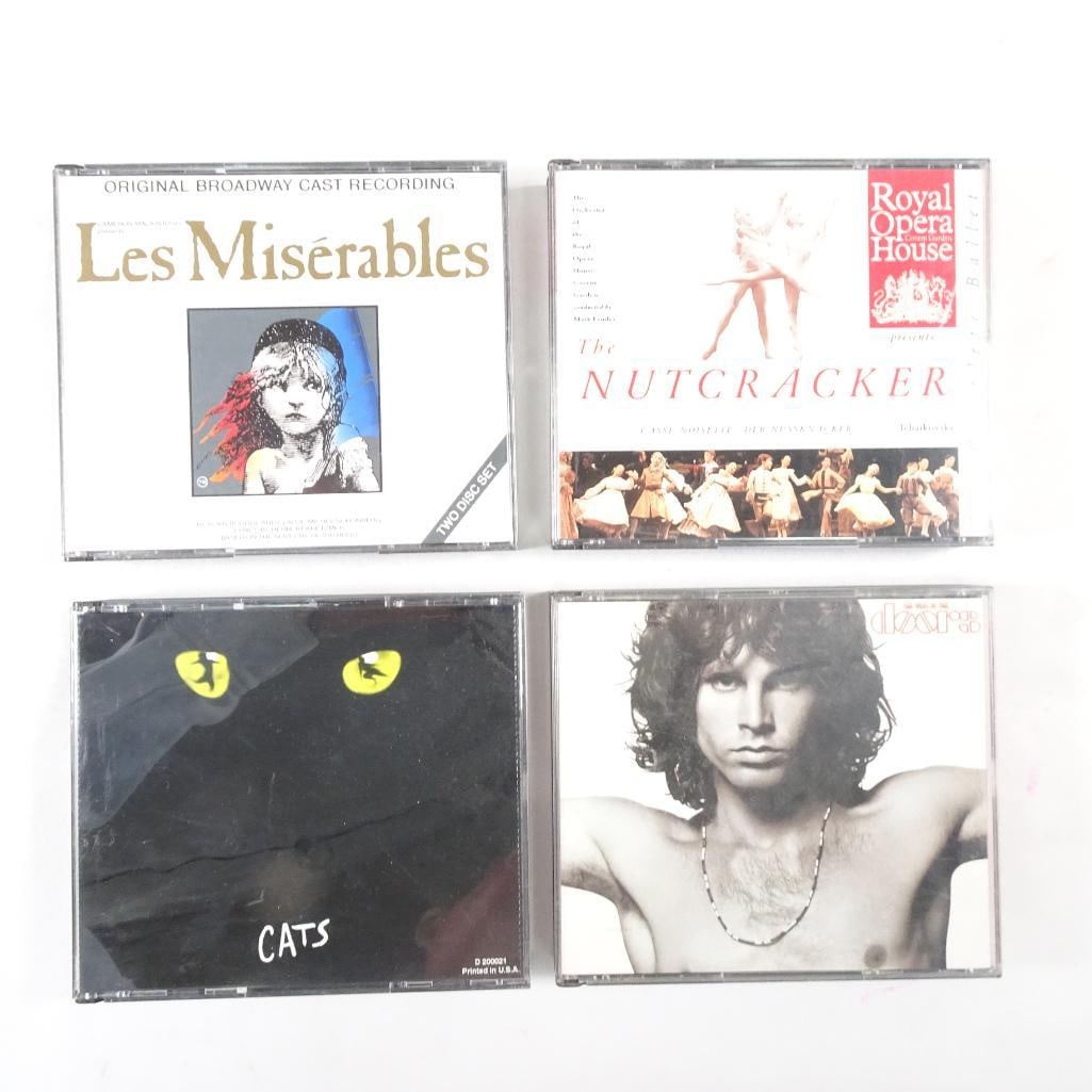 CD Lot Musicals and Classics Les Miserables Cats Nutcracker Jim Morrison The Doors 5 CDs: Mixed CD lot including musicals, classical, and classic rock titles. Condition: Discs in good to very good condition Cases may show light wear Includes original inserts (as shown in photos) Great vari