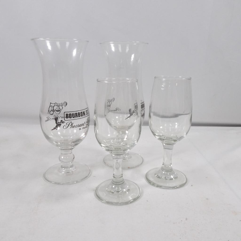 Mixed Lot Glassware Bourbon St Pheasant Run Theatre + Wine Glasses Set 6 pcs: Mixed lot of assorted glassware including souvenir and everyday drinking glasses. Condition: Pre-owned, good condition No cracks or chips observed Light surface wear from normal use Perfect for: Barwa