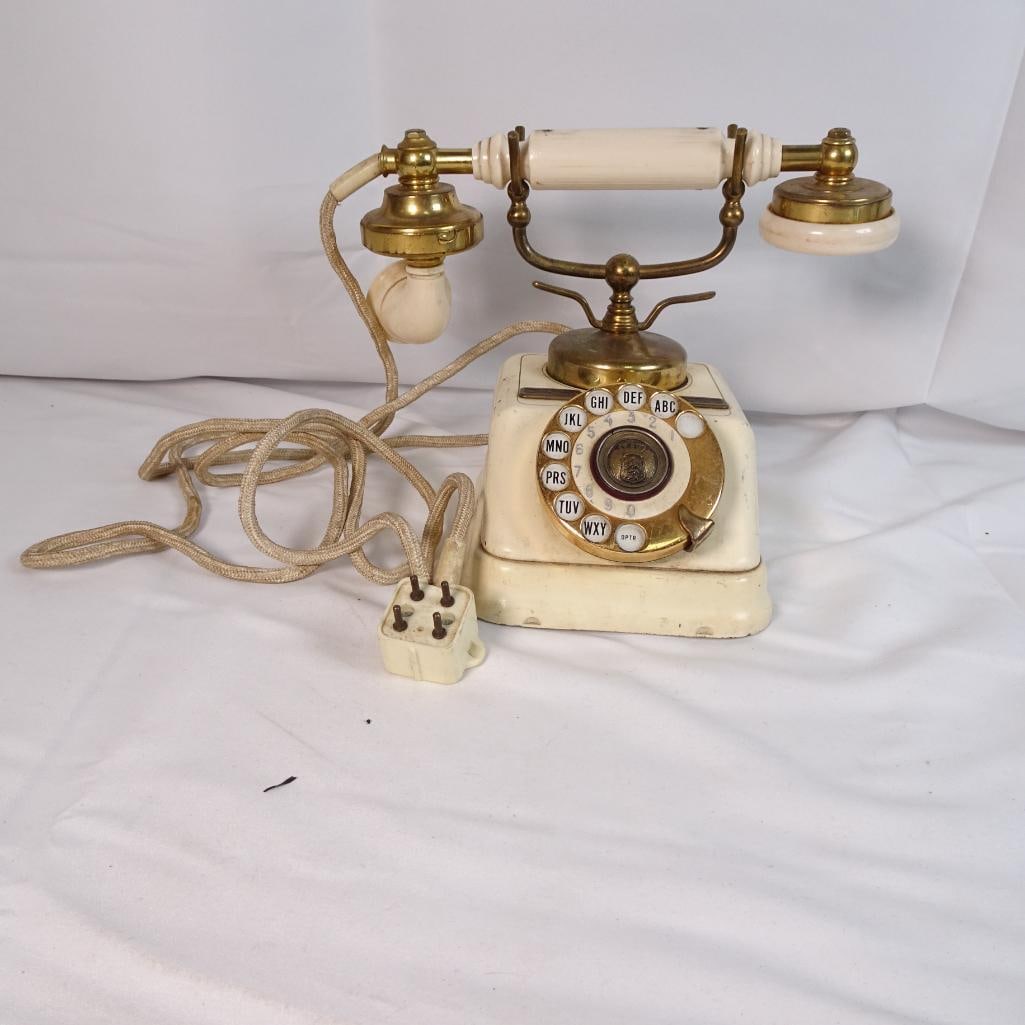 Vintage Rotary Telephone Cream Bakelite Style Brass Accents European Retro Desk Phone: Beautiful vintage rotary telephone featuring a classic cream-colored body with brass accents and a traditional rotary dial. This piece has a charming European vintage aesthetic, making it perfect as a