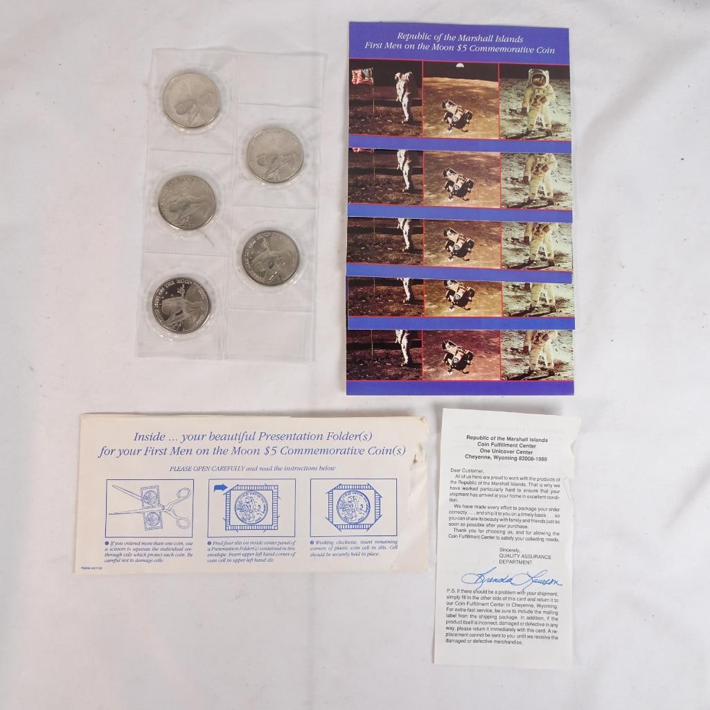 Republic of Marshall Islands 1989 First Men on the Moon $5 Coin Set 5 Coins w/ Papers: Set of 5 commemorative coins from the Republic of the Marshall Islands (1989). ?First Men on the Moon? Apollo theme Includes 5 coins in original plastic sleeves Comes with original paperwork and inser
