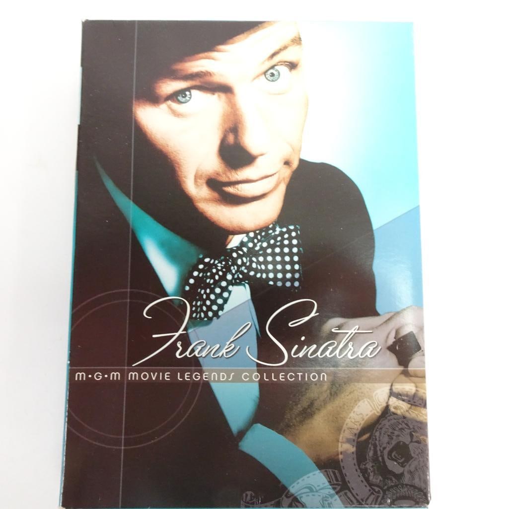 Frank Sinatra MGM Movie Legends Collection DVD 5 Film Set Guys and Dolls Manchurian Candidate: Frank Sinatra - MGM Movie Legends Collection DVD set featuring 5 classic films starring one of Hollywood?s greatest icons. Condition: Pre-owned. DVDs and cases in good condition with light signs of us