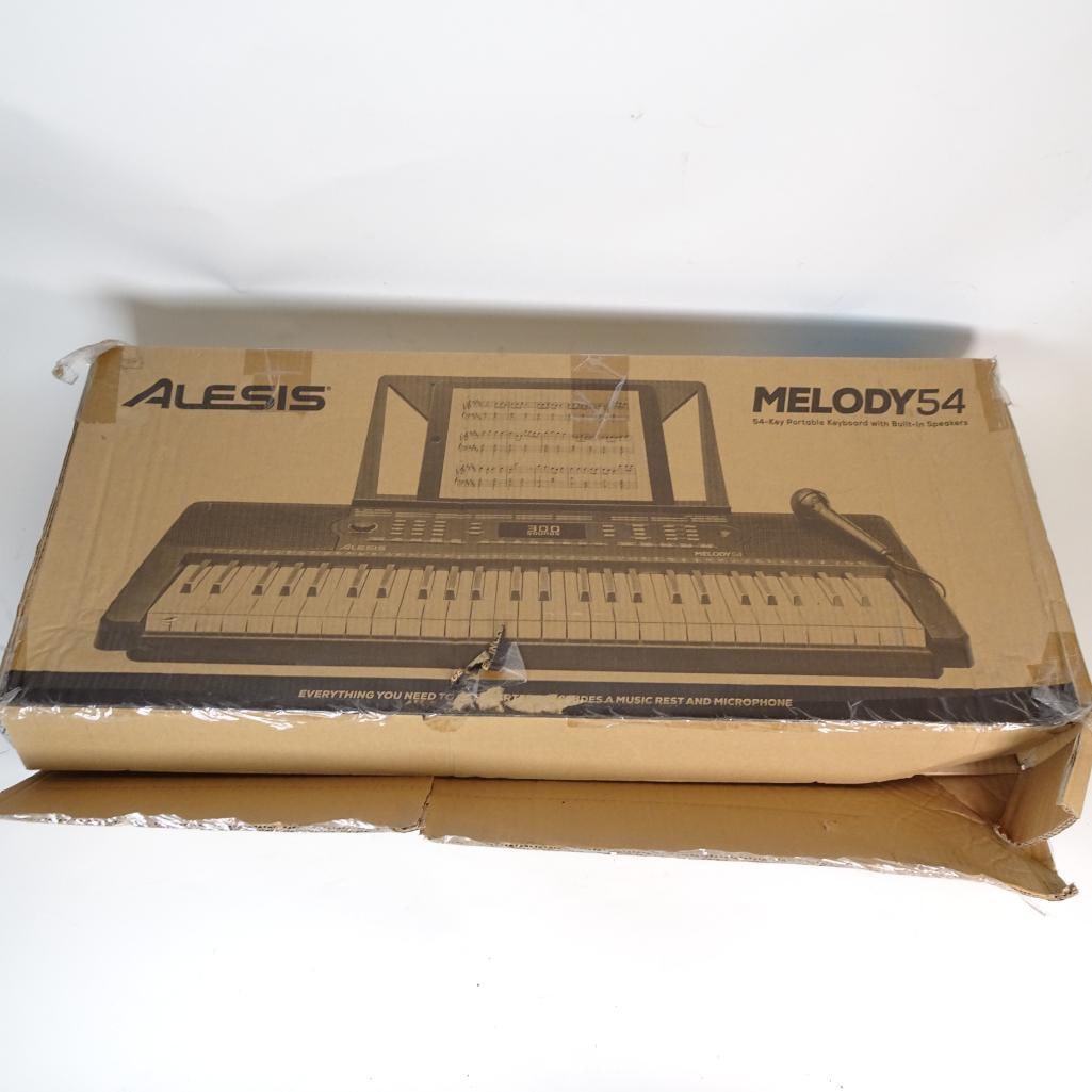 Alesis Melody 54-Key Portable Electronic Keyboard: Alesis Melody 54 portable electronic keyboard in very good condition. Ideal for beginners, students, and home learning. Features 54 full-size keys, 300 built-in rhythms, multiple tones, demo songs, su