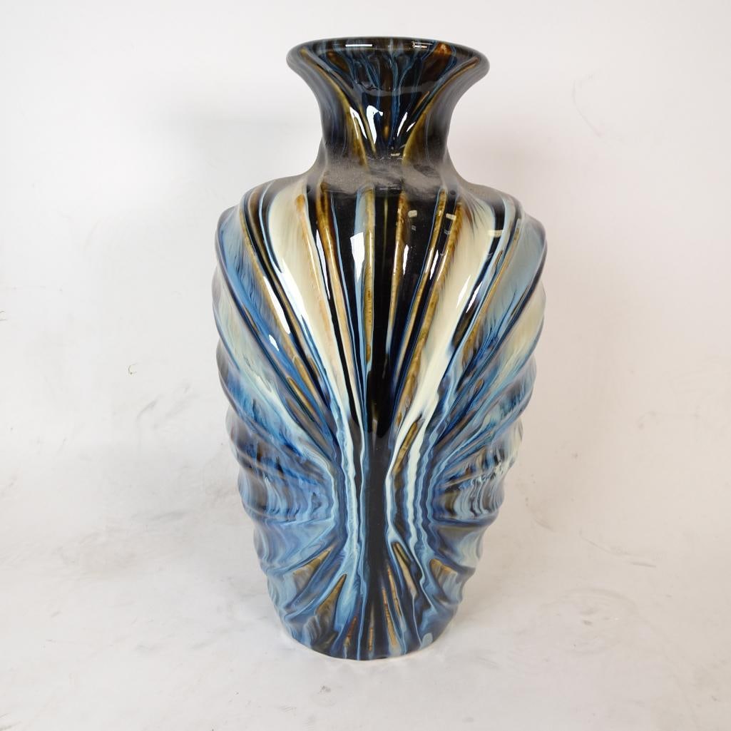 Large Art Pottery Vase Blue Brown Drip Glaze: Striking large decorative art pottery vase featuring a sculptural ribbed form with beautiful flowing drip glaze in deep blue, cream, brown, and charcoal tones. The organic glaze pattern creates a