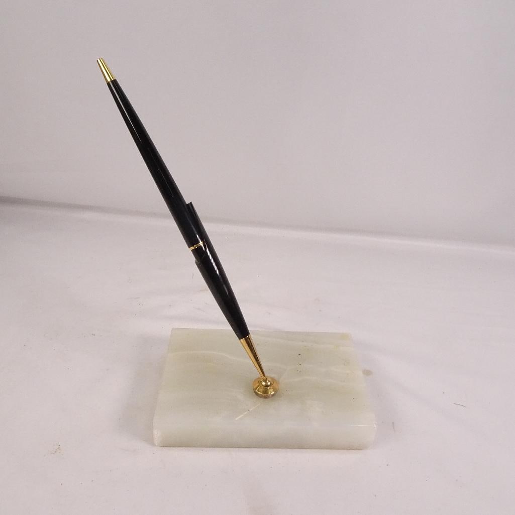 Vintage Black & Gold Desk Pen Set with White Marble Base: Elegant vintage desk pen set featuring a black and gold-tone ballpoint pen mounted on a white marble or onyx-style stone base. Classic executive office dcor piece perfect for desk display, office use,