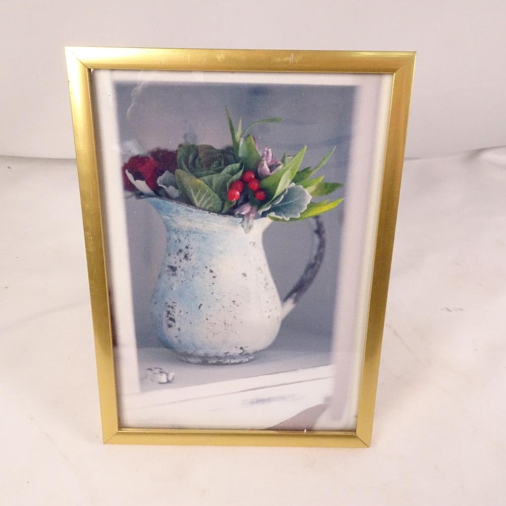 Hobby Lobby Framed Floral Still Life Print: Decorative framed floral still life print featuring a rustic white pitcher filled with greenery, flowers, and red berries. Presented in an elegant gold-tone frame suitable for tabletop display or wall