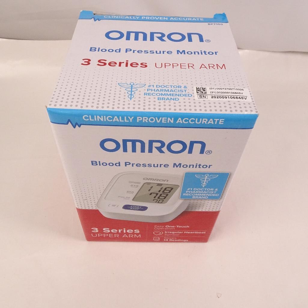 Omron 3 Series Upper Arm Blood Pressure Monitor BP7100 Complete in Box: Omron 3 Series Upper Arm Blood Pressure Monitor, Model BP7100, complete with cuff, monitor, instruction manual, and original box. Condition: Appears clean and lightly used or unused. Includes monitor,