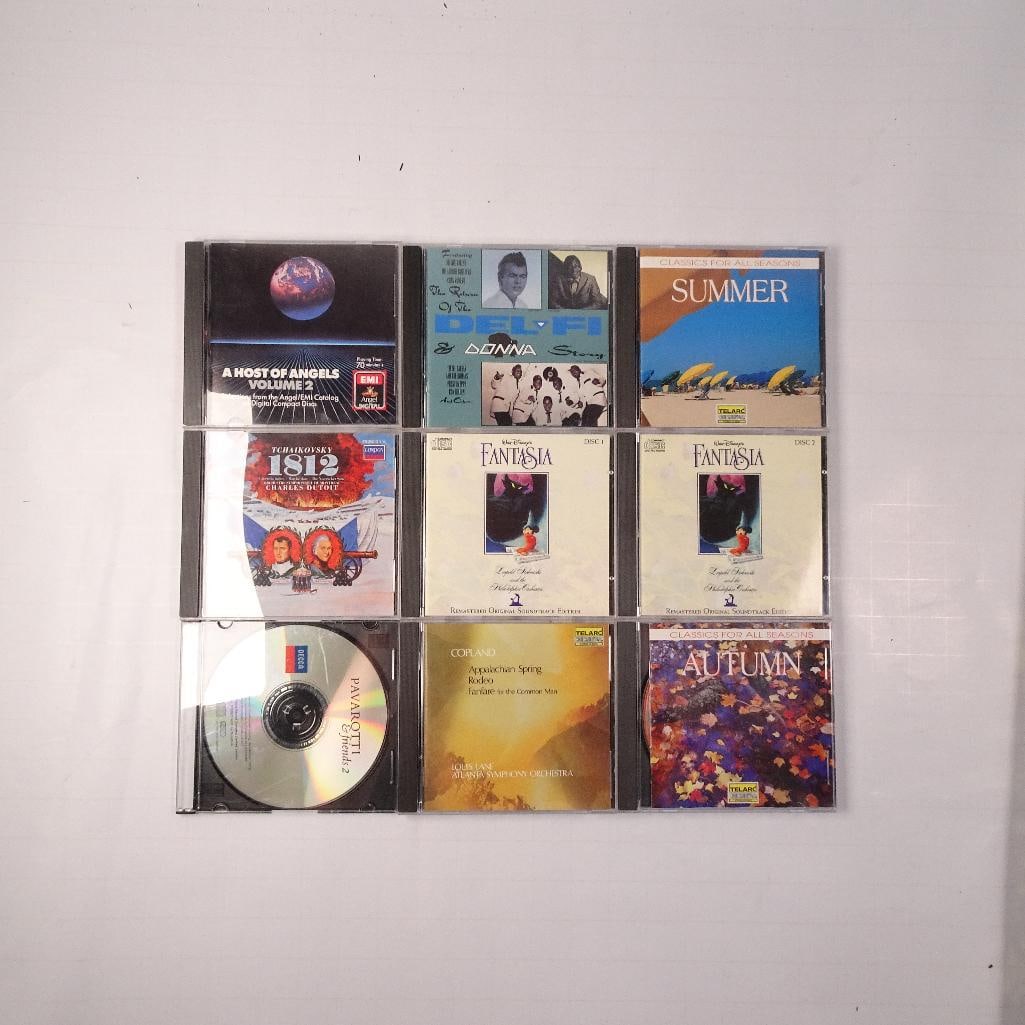 Lot of 8 Classical Music CDs: Collection of 8 classical music CDs featuring opera, symphonic works, orchestral favorites, soundtrack recordings, and vocal performances. Pre-owned condition with normal wear from age and use. Cases 