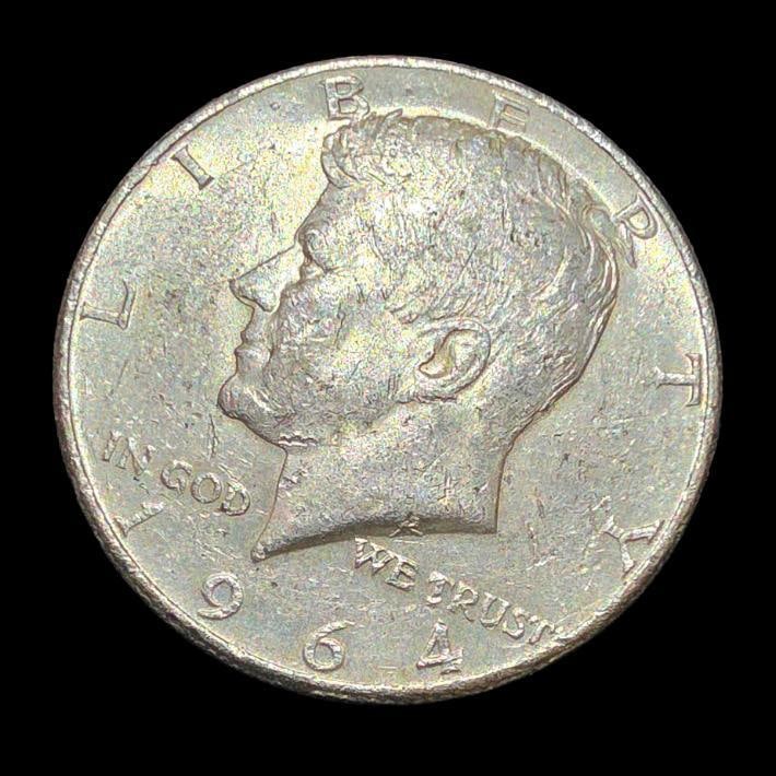 1964 Kennedy Silver Half Dollar - 90% Silver - Nice Collector Coin: Offered is an original 1964 Kennedy Half Dollar, the first year of issue honoring President John F. Kennedy. This coin is composed of 90% silver, making it popular with both collectors and silver inve