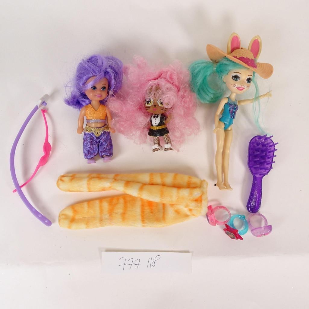 Mixed Doll Lot with Accessories: Mixed lot of pre-owned dolls and accessories as shown in the photos.Includes several dolls of different sizes and styles along with assorted accessories.Please review all photos carefully as they are 