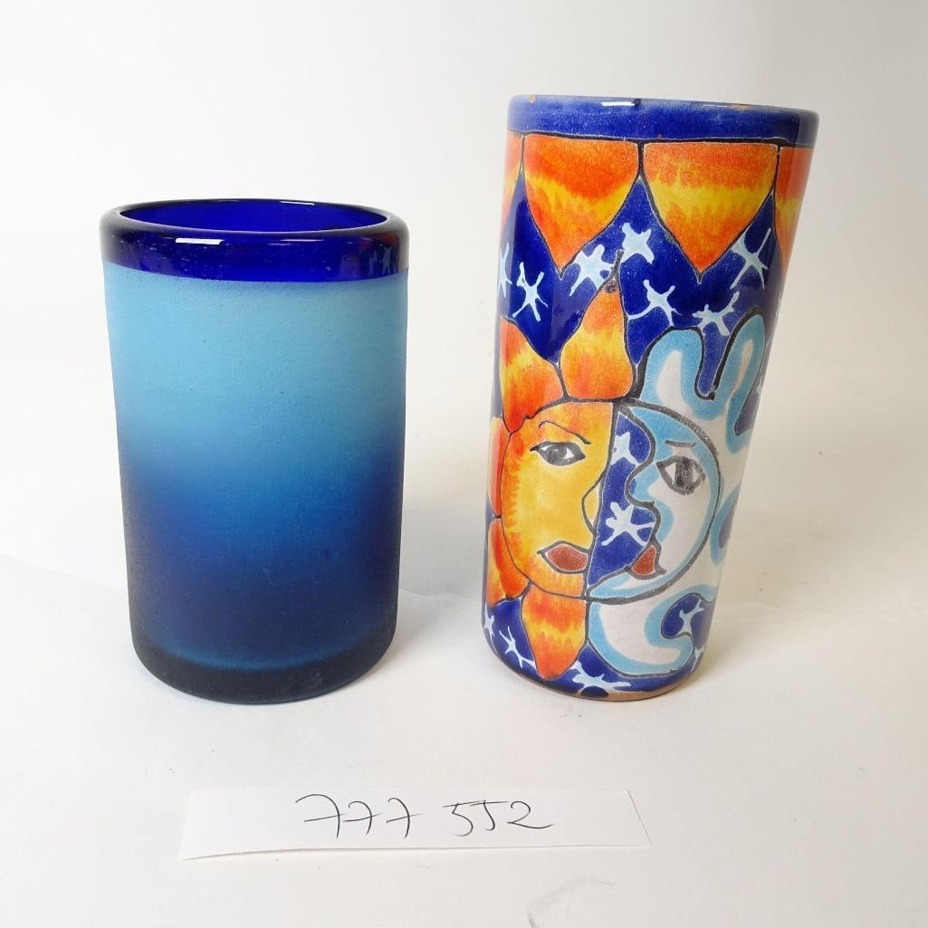 Blue Glass Tumbler and Sun-Moon Ceramic Vase Set: Unique decorative set featuring a frosted blue glass tumbler with cobalt rim (approx. 5 in tall) paired with a hand-painted ceramic vase featuring a sun and moon motif (approx. 6 in tall). Beautiful b