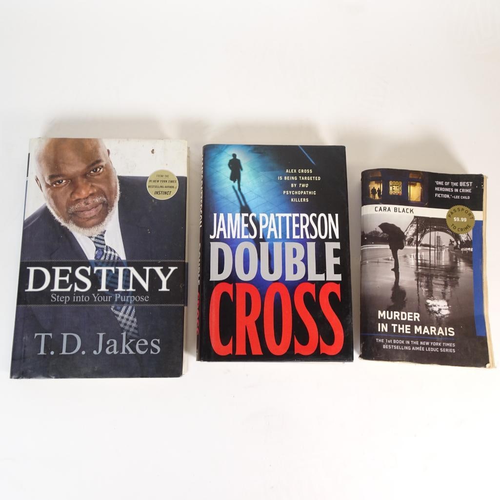 Book Lot of 3: Mixed book lot including inspirational reading and popular mystery/thriller fiction titles. Condition: Pre-owned condition with visible signs of reading and shelf wear, especially on the paperback edg