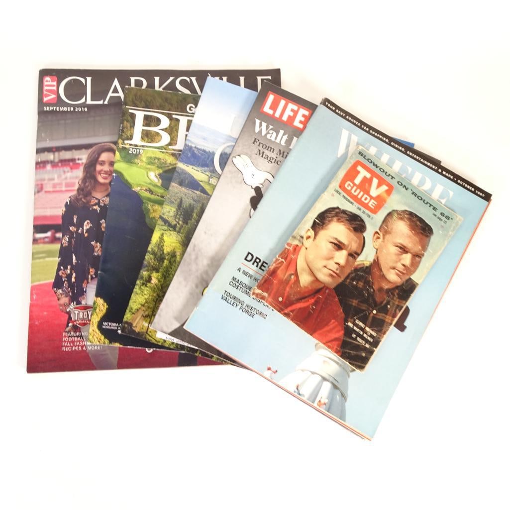 Vintage Magazine Lot: Mixed vintage and collectible magazine lot featuring a variety of themes including pop culture, travel, golf, and local publications. Condition varies from good to visibly worn due to age and handling