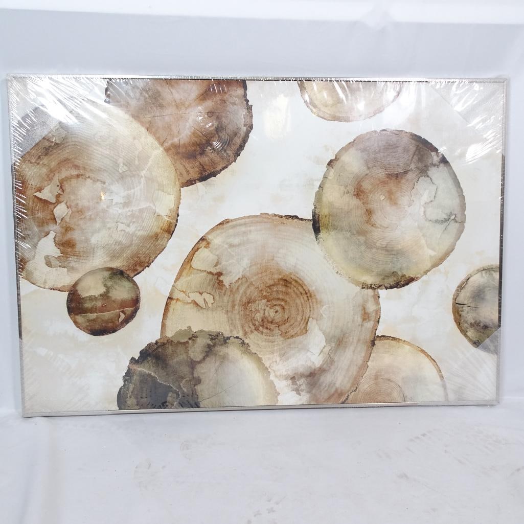 New 32" x 25" Tree_Ring Watercolor Canvas: A brand_new, factory_wrapped canvas featuring a modern watercolor interpretation of tree rings in warm neutral tones. The artwork blends shades of beige, brown, and gray to create an organic,