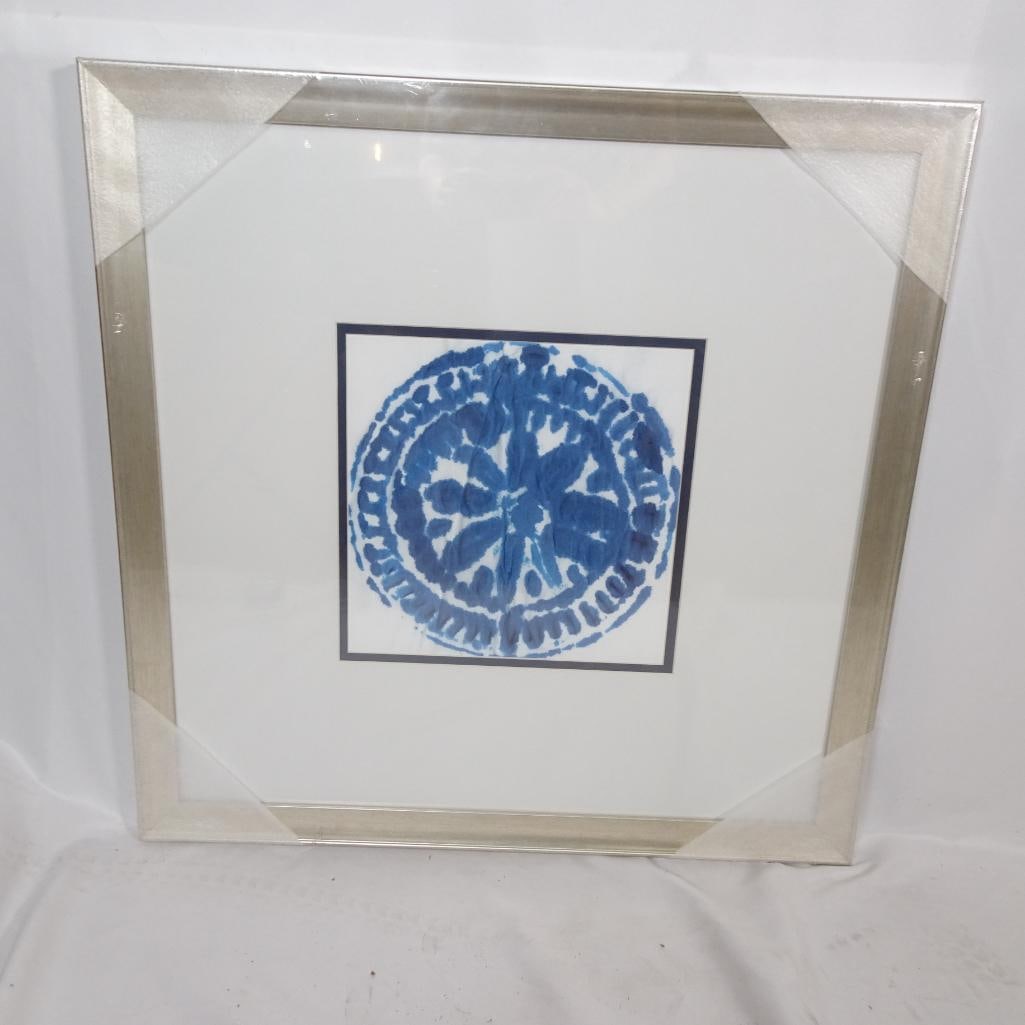 Large Framed Wall Art ?Indigo Dye VI": Beautiful framed abstract artwork titled "Indigo Dye VI" by Made on Earth. Features a hand-painted style indigo blue medallion design inspired by traditional dye techniques and global textile patterns