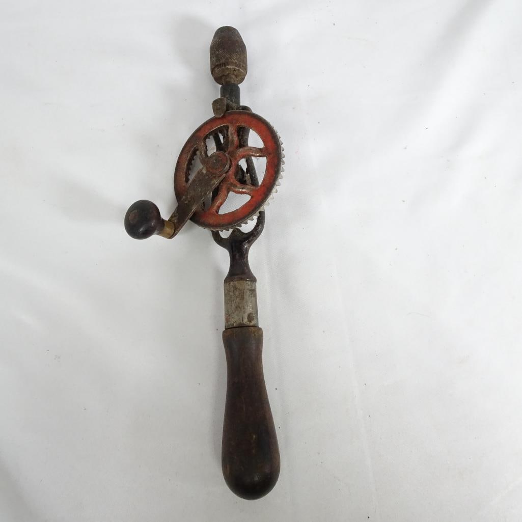 Vintage Hand Drill Egg Beater Style Manual Drill Wood Handle Old Tool: Vintage hand drill (egg beater style) with wooden handle and metal gears. ? Condition: Used vintage condition Visible rust, wear, and dirt from age Gears turn but may need oiling/restoration Sold as-i