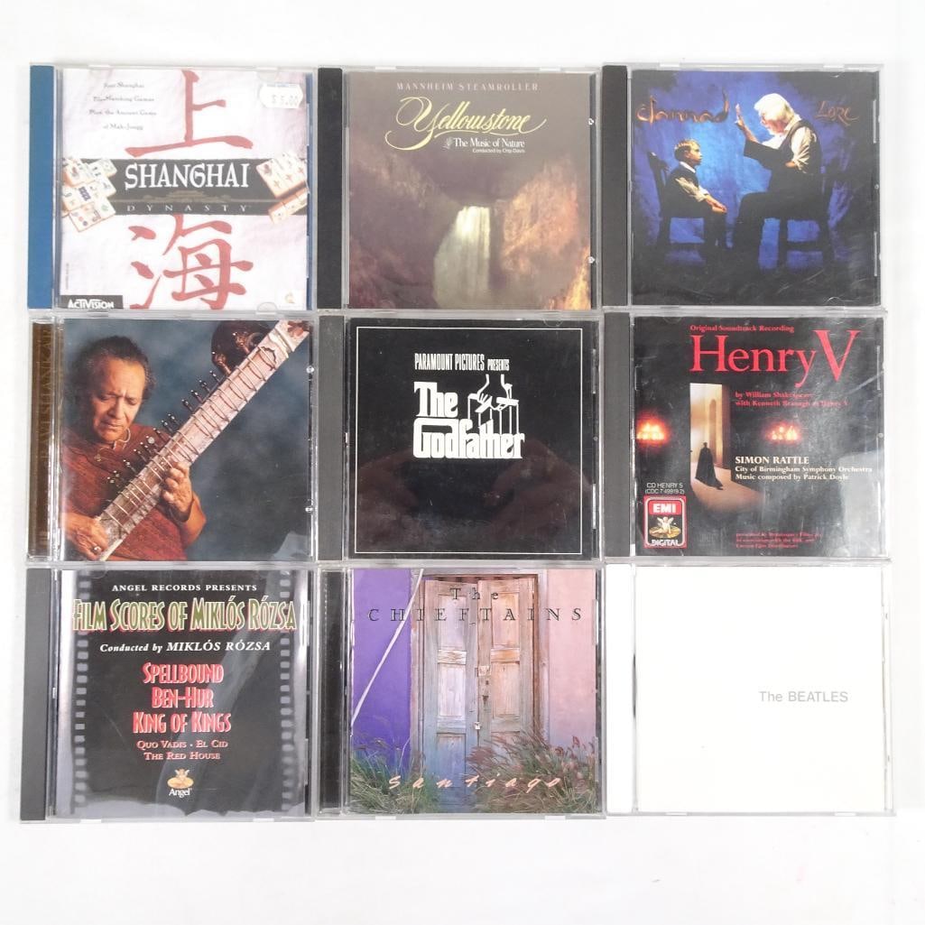 Mixed CD Lot Beatles White Album Godfather Clannad Soundtracks 9 CDs: Mixed music CD lot including rock, soundtracks, and world/new age titles. Condition: Discs in good to very good condition Some wear on cases Includes original inserts (see photos) Great mix for collec