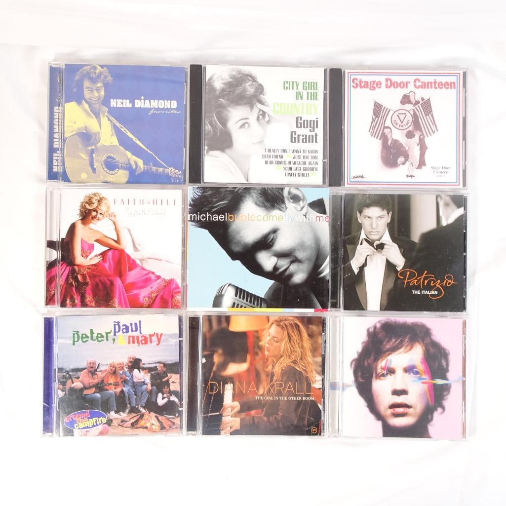 Lot of 9 Music CDs Michael Buble Diana Krall Neil Diamond Faith Hill + More: Mixed lot of 9 music CDs featuring a great blend of pop, jazz, vocal, and classic hits. A very listenable and popular mix, perfect for everyday music, collectors, or resale. Sold as one lot,?exactly a