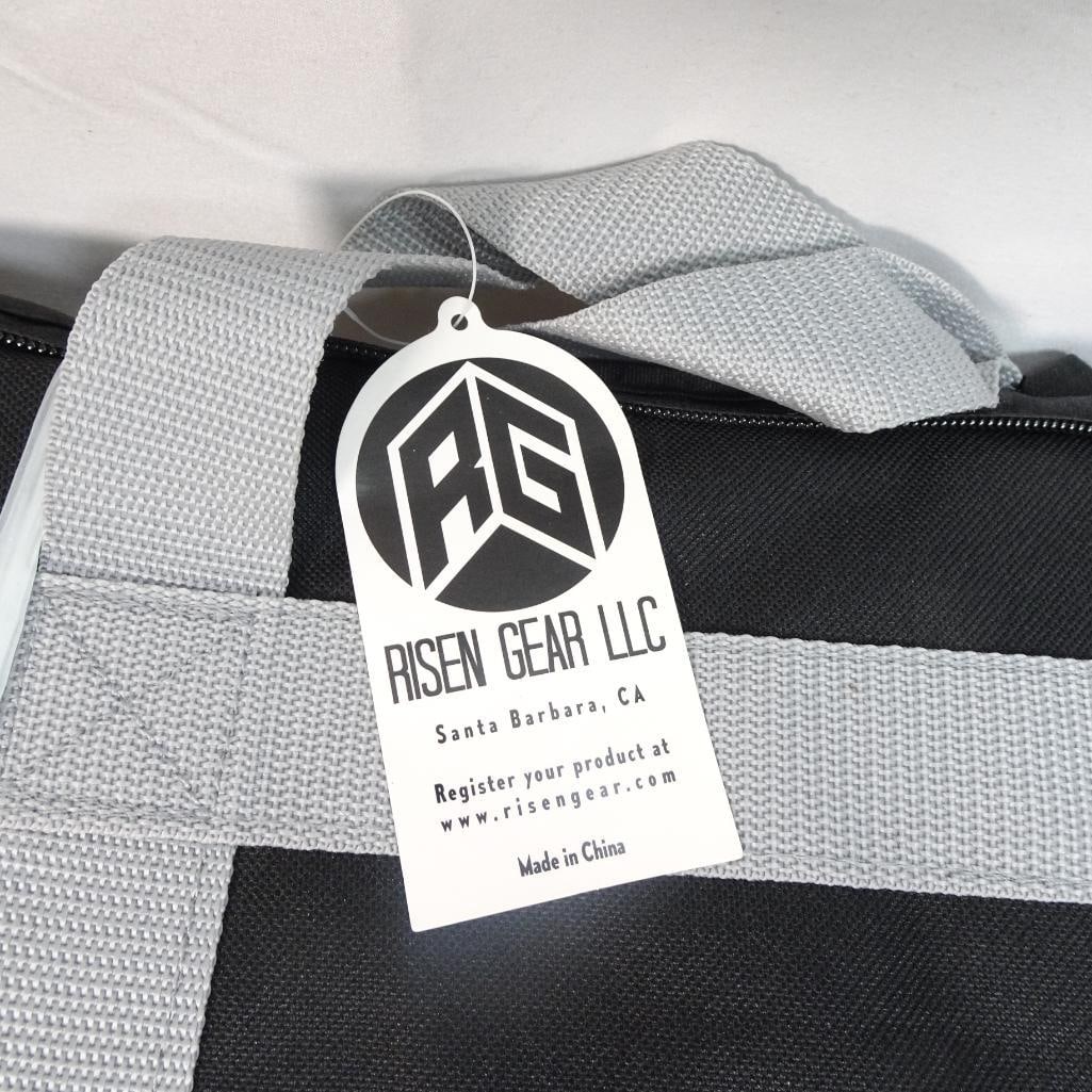 Risen Gear LLC Padded Utility Storage Carry Bag Black Gray 26" x 17" New: Risen Gear LLC padded utility / storage carry bag in black and gray. This soft-sided bag appears to be new / unused with original tag attached and is ideal for storing or transporting gear, tools, acc