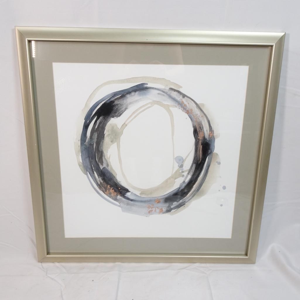 Made on Earth Neutral Revolution I Framed Abstract Wall Art: Elegant framed abstract wall art by Made on Earth titled "Neutral Revolution I." This piece features a soft circular abstract design in layered neutral tones including gray, black, beige, taupe, and s