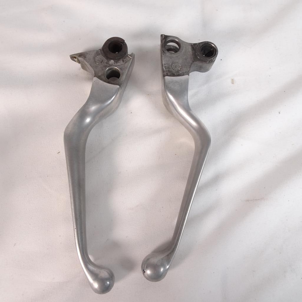 Motorcycle Brake and Clutch Lever Set OEM Aluminum Silver Handlebar Levers (Pair): Set of 2 OEM motorcycle levers, brake and clutch. _ Solid aluminum construction _ OEM style / factory replacement _ Smooth curved ergonomic design _ Mounting points intact _ Suitable for various motor