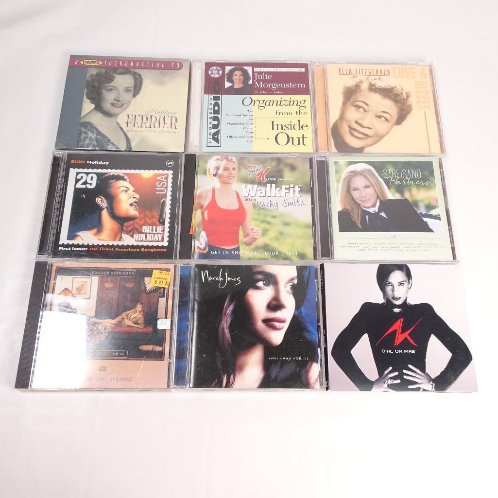 Lot of 9 CDs: Pre-owned lot of 9 music CDs featuring jazz, pop, vocal, adult contemporary, and inspirational titles from well-known artists. Sold as one lot.
