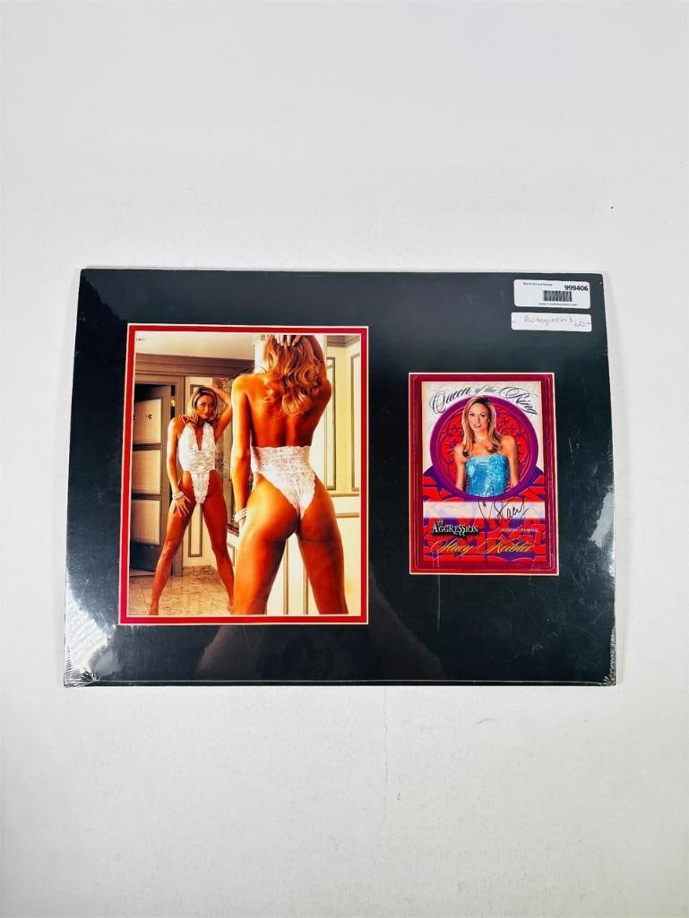 Stacy Keibler WWE Autograph Fleer Aggression Card: rare dual-autograph Stacy Keibler WWE Diva lot. This premium set includes a highly sought-after 2003 Fleer Aggression card and an autographed 8x10 photograph. Stacy Keibler remains one of the most ico