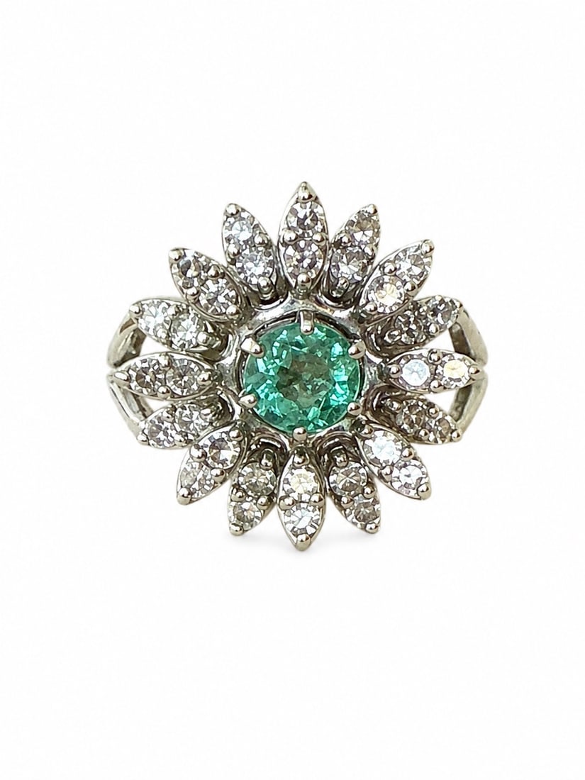 Vintage Emerald and Diamond flower Ring: Cocktail ring size 6.75, 6.5 nice center Emerald (gold Weight 4.91dwt) Stamped 14k white with 32 round diamonds 2mm aprox .75 inches wide aprox .96 cts tested 14k