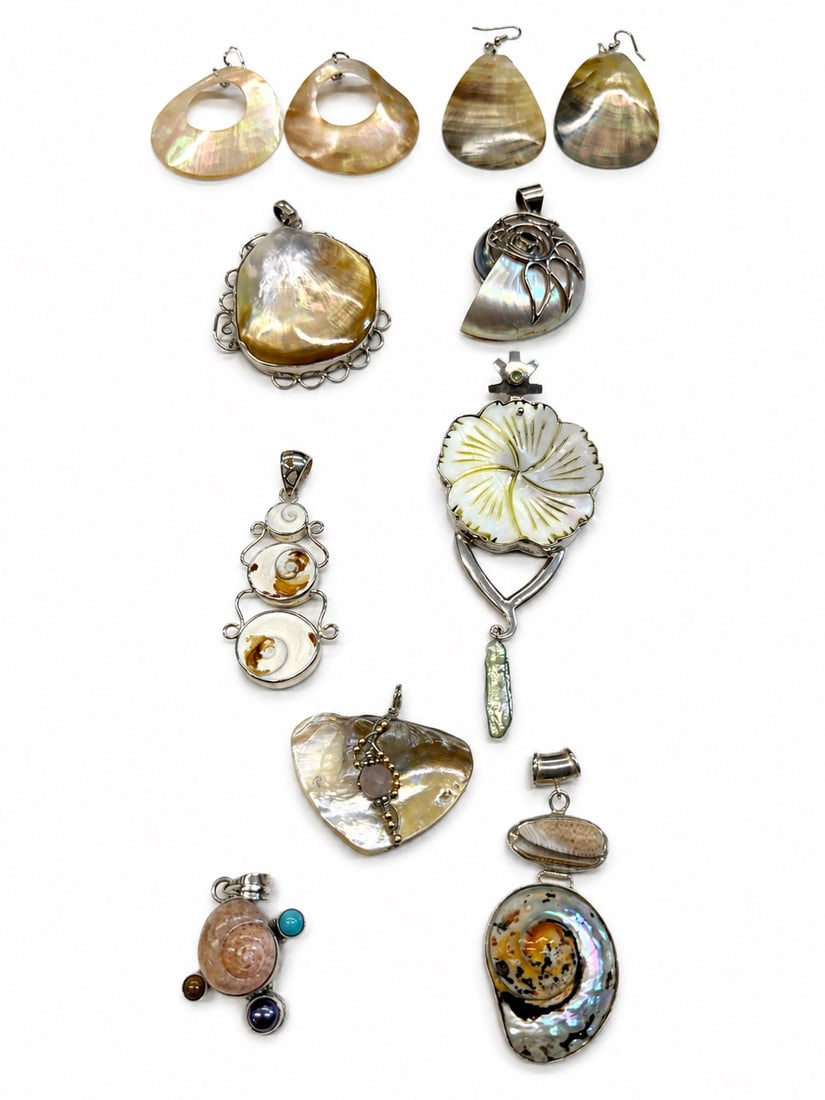 7 sterling silver pendants with shell & gemstones: Collection of NOS from retail store 2 pairs of mother of pearl earrings with base metal earwires selection of shell and sterling pendants