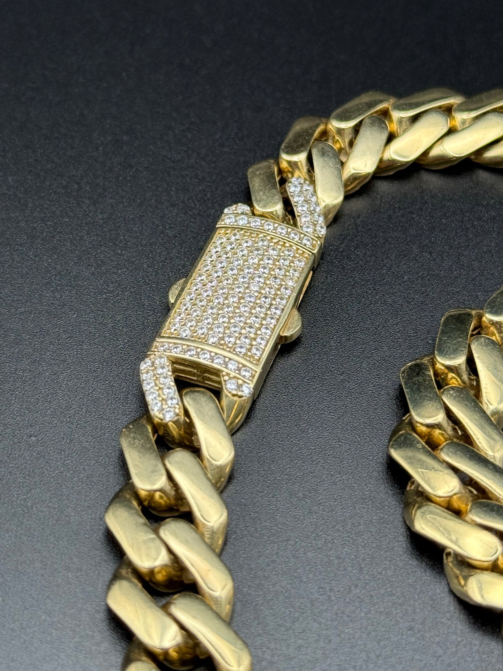 14k Cuban Link Necklace with pave Cubic Zironia clasp: Large dynamic Gold semi hollow 22 inch x .5 inch ( weight 48.7 g )chain with multi CZ handset pave clasp