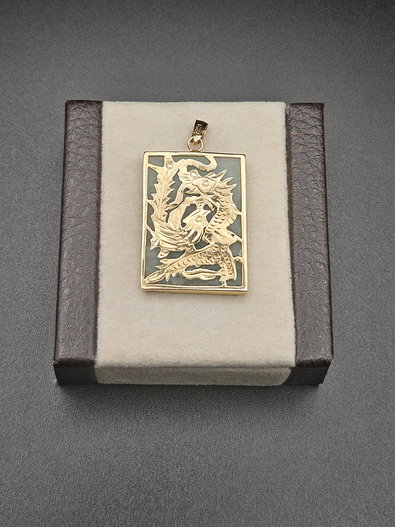 Jade Pendant with carved dragon in14K yellow gold: beautiful open gold work weight (4.4g) 1 x 3/4 inch Rectangle jade. With 14k bail 1.5" ready to put on your gold chain. Jade is symbol of luck, prosperity, harmony, inner peace and wisdom!