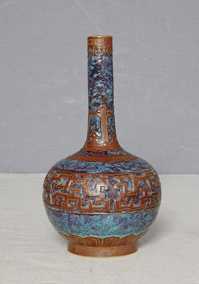 Chinese Lu-Jun Glaze Porcelain Long Neck Vase With Mark: Chinese Lu-Jun glaze porcelain long neck vase, decorated with brown glaze flower pattern. Six relief of Chinese character mark on the base. Good condition. 7.5" height.