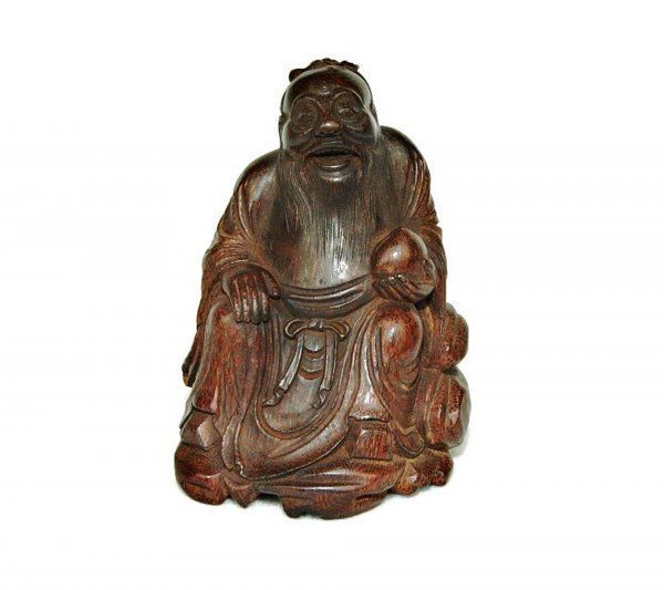 Chinese Carved Bamboo Sage w/Peach: Chinese bamboo figural carving, depicting a Chinese sage seated in long robes with a large peach held in his left hand, the laughing face with a long beard and small soft cap, 5.5''