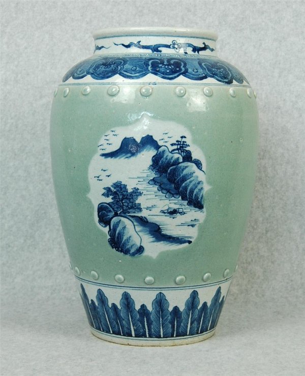 Chinese Blue and White with Celadon Glazed Porcel: Chinese Blue and White with Celadon Glazed Porcelain Jar, decorated landscape and mountain with open window. Circa 1900. 16" H.