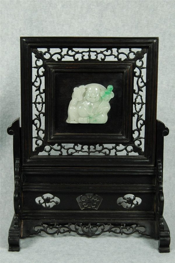 Chinese carved jadeite hardwood-framed table scre: Chinese carved jadeite hardwood-framed table screen, decorated one side with happy buddha holding a scepter and one side with some Chinese calligraphy. 14.75" x 11.5".