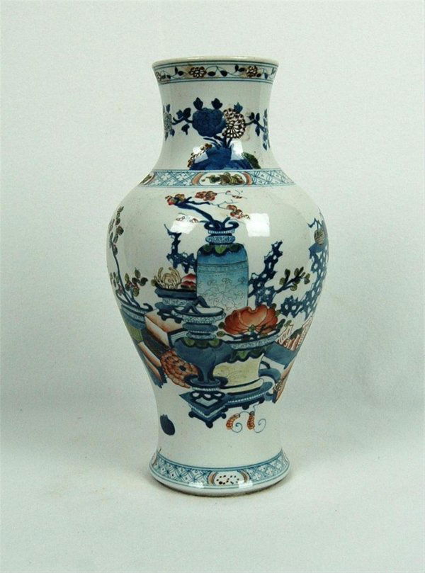 Chinese Blue and Whie with Wu-Cai Porcelain vase: Chinese Blue and Whie with Wu-Cai Porcelain Vase, decorated with floral and game board. 13.25" high.