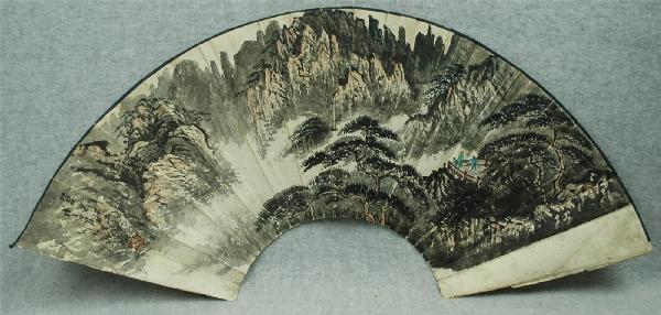 Chinese Fan Painting: Chinese fan painting, ink and color on paper, 20th century, featuring a majestic mountain landscape with figures on a cliff overlooking a misty valley, left top with a short colophon with a cyclical d