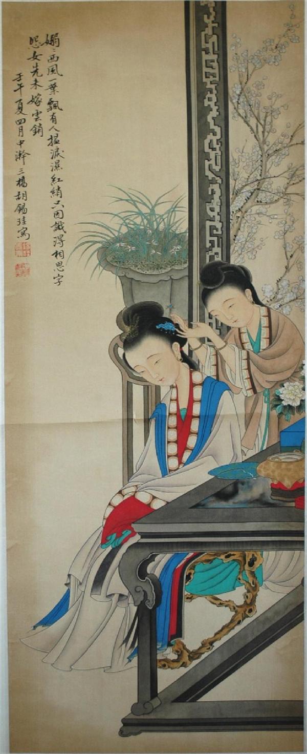 Chinese Scroll Painting: Chinese hanging scroll painting, ink and color on paper, featuring a female attendant adjusting the hairpins in the coiffure of a Chinese beauty seated at a table backed by a large screen, the top lef