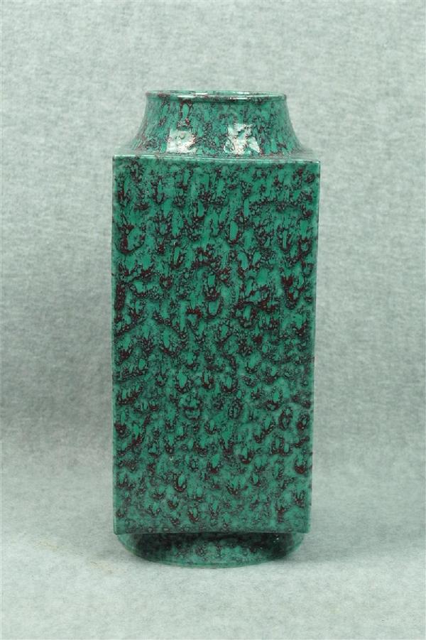 Chinese Robins Egg Glazed Rectangular Vase: Chinese robins egg blue glazed rectangular vase, with a wide round mouth and resting on a high circular foot, covered overall in a mottled blue and bright green colored glaze, the base impressed with