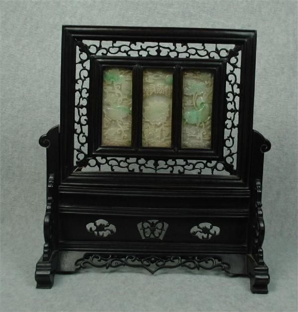 Chinese Hardwood Table Screen With Three Jadeite : Chinese dark-stained hardwood table screen with three jadeite panels, the pale green stone plaques carved and undercut as a continuous scene of a lotus pond with large carp swimming amid lush foliage 
