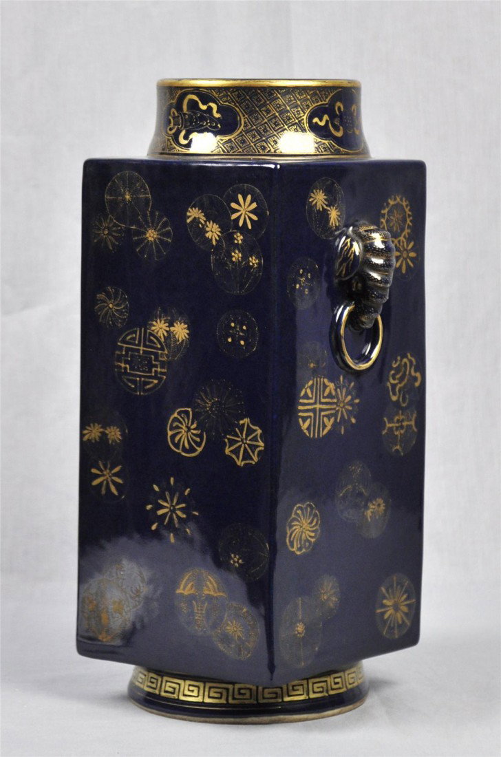 Chinese Dark Blue Glazed Cong-Style Porcelai: Chinese dark blue glazed cong-style porcelain square vase, decorated with gold floral. 13" height.