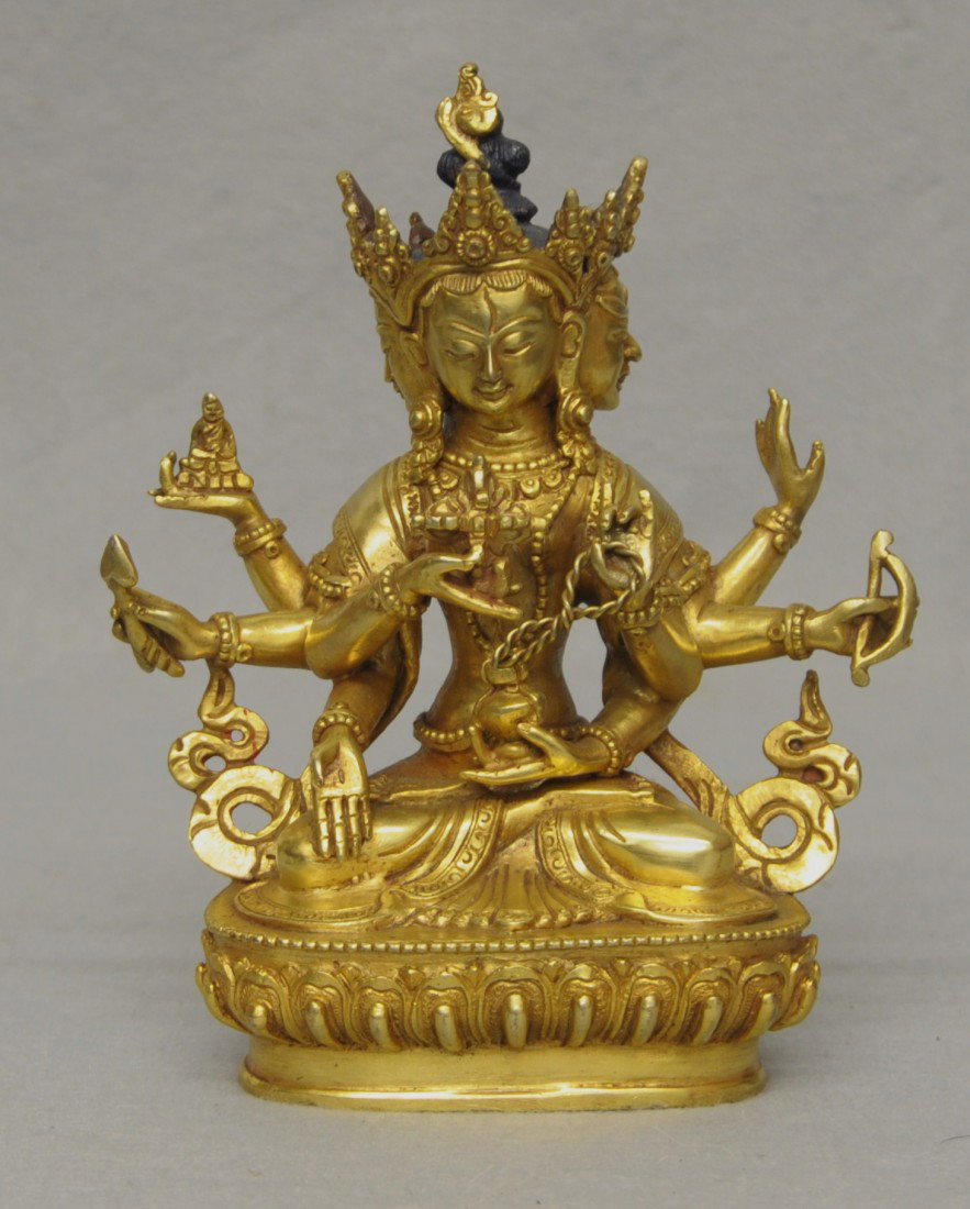 Sino-Tibettan Gilt Bronze Seated Buddhist Fi: Sino-Tibetan gilt bronze seated Buddhist figure. 6.5" height.