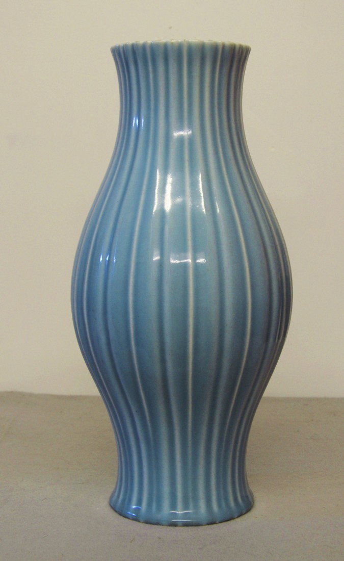 Chinese Mnochrome Blue Glaze Olive Shape Po: Chinese monochrome blue glaze olive shape porcelain vase. Six blue character under glaze mark. 15.5" height.