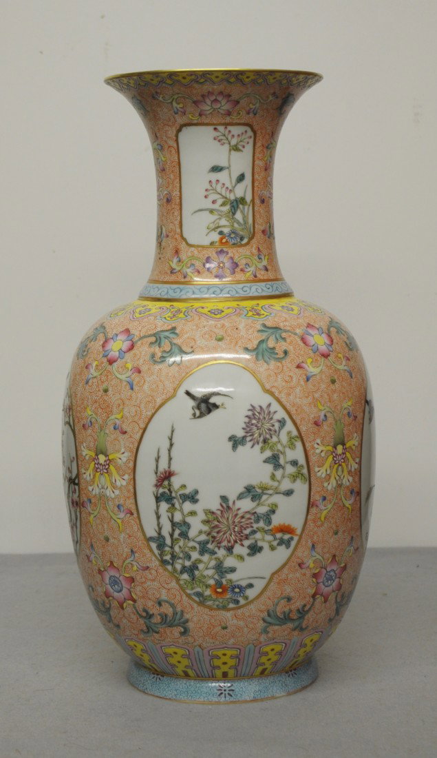 Chinese Famille Rose Porcelain Vase: Chinese famille rose porcelain vase, decorated with four open window of birds and flowers. Six red character under glaze mark on the base. 15" height.